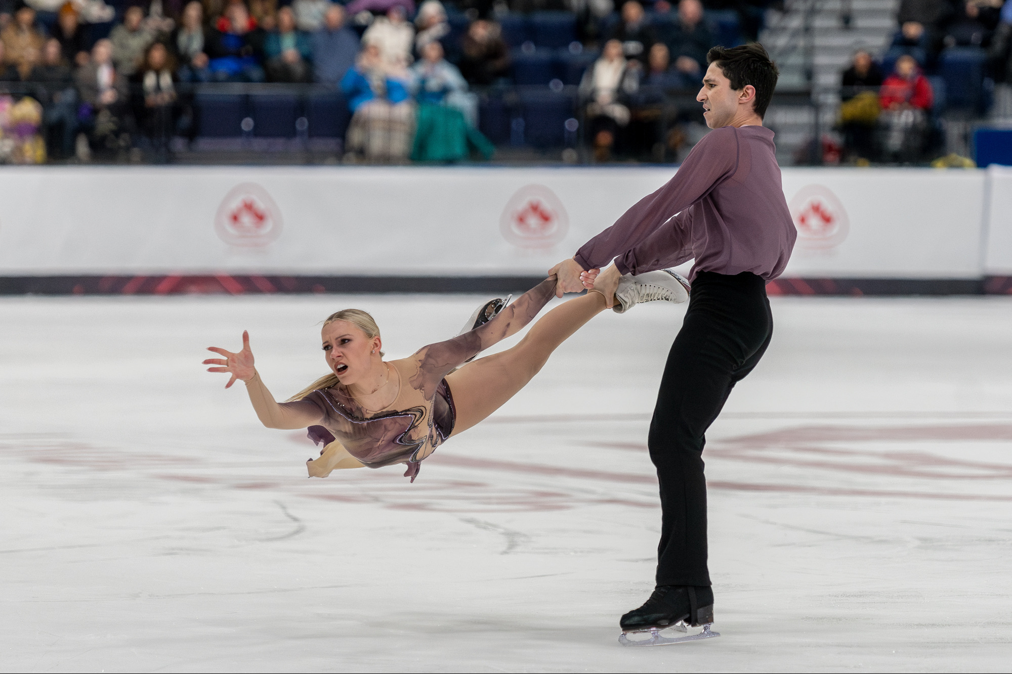 Marjorie Lajoie and Zachery Lagha stun the crowd at the 2025 Canadian National Skating Championships at Laval's Place Bell, on January 19, 2025 | Photo: Kieron Yates