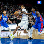 Patrick McCaw of the Delaware Blue Coats storms the paint against Long Island Nets Trevon Scott on February 8, 2025. | Photo: Kieron Yates
