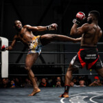 Moise Lissala kicks Joseph_Nabong in a title fight at MFL 41 in Chambly, Quebec on December 14, 2024 | Photo: Kieron Yates
